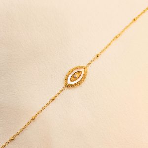 Bracelet acier inoxydable doré et œil nacré